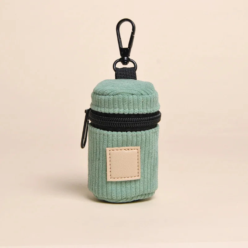 Porte sac à déjections en velours côtelé muni d'un crochet