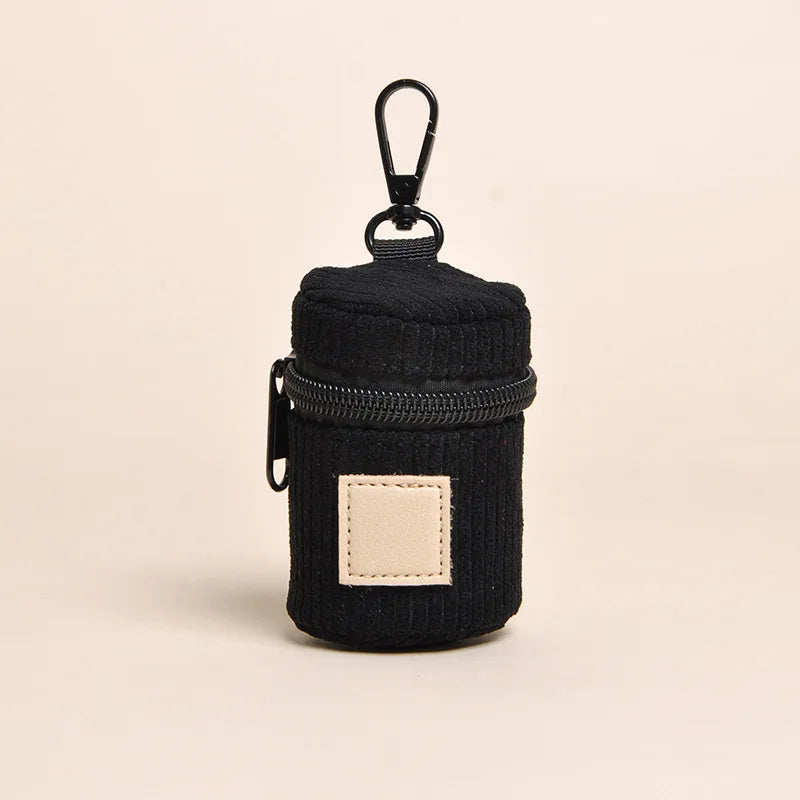 Porte sac à déjections en velours côtelé muni d'un crochet