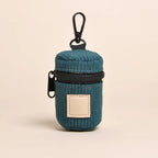 Porte sac à déjections en velours côtelé muni d'un crochet